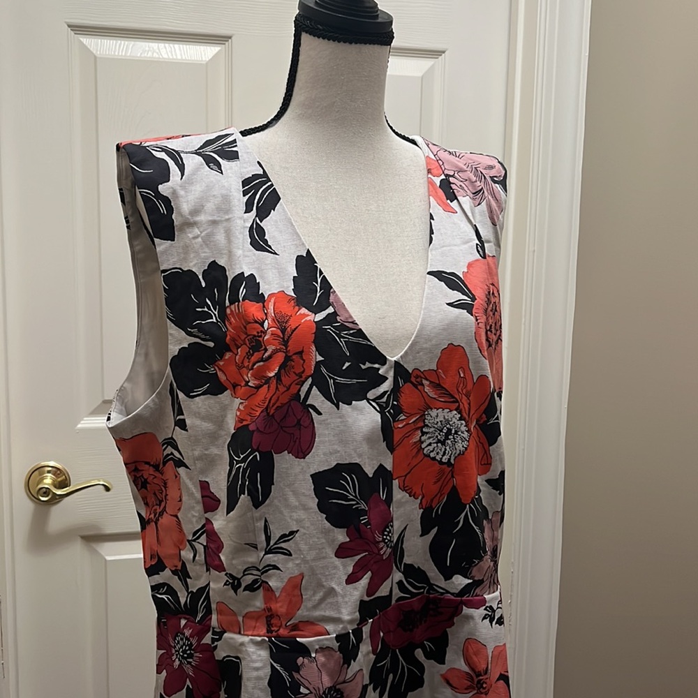 Brand new Ann Taylor dress with tags sleeveless. Elegant. Floral print. Cottony